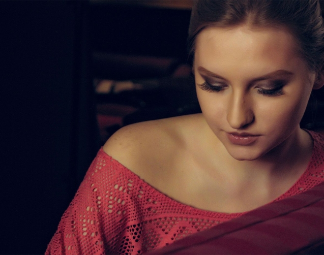 lady with russian volume eyelash extensions models them